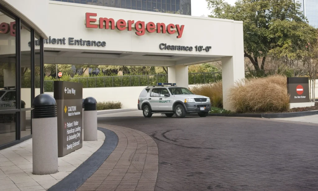 Picture is of a marked security vehicle outside of an emergency room of a healthcare facility.  Security in healthcare facilities in the form of patrols, guards (armed or unarmed) helps deter workplace violence, theft, and mitigates risk and eases patients, staff, and visitors minds.